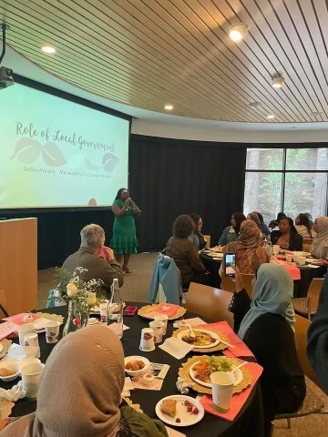 Council Member Wonsley speaking at RISE Eid dinner