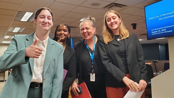 NCR Urban Scholars Fatima, Georgia and Cait in Council Chambers Aug. 2024