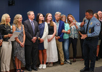 Minneapolis Police Chief Brian O'Hara thanks Commander Kathy Waite for her 30 years of service at the Sept. 19 city council meeting.