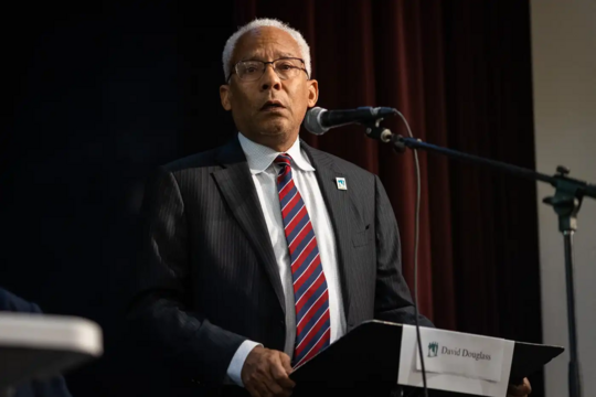 Photo by Ben Hovland  |  MPR News  |  ELEFA team lead David Douglass speaks during a public meeting at the Sabathani Community Center in Minneapolis.