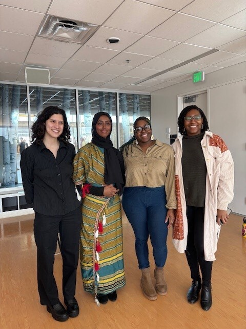 Council Member Wonsley at the University of Minnesota Black Artists Showcase with student organizers and artists.