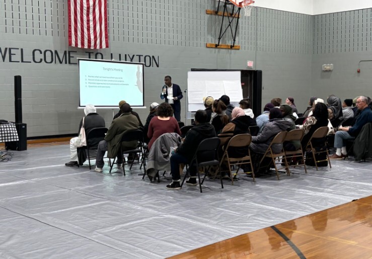 MPHA Director Abdi Warsame presenting to Glendale Townhomes residents.