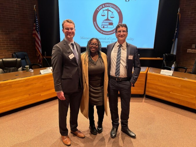Council Member Wonsley alongside University of Minnesota Law Symposium organizers. 