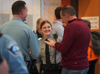 Lila Hanson, a CSO, visits with family members, many of whom have served and currently serve in the Minneapolis Police Department.