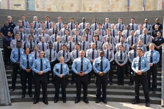 Group photo of Community Service Officers, MPD interns, and MPD leadership