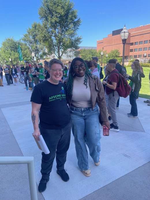 Council Member Wonsley with an AFSCME worker leader. 