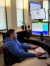 Telecommunicator works in the 911/Minneapolis Emergency Communications Center
