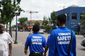 Community safety ambassadors walking on E. Franklin Ave.