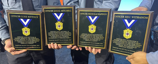 The awards given to Officers Luke Kittock, Jamal Mitchell (posthumously), Nicholas Kapinos, and Eric Withanom.