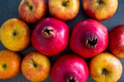 Decorative pictures of apples and pomegranates