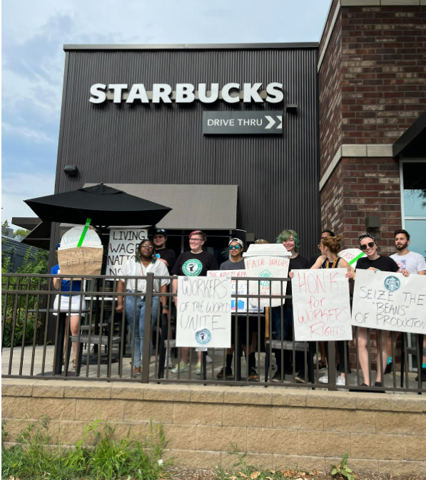 CM Wonsley with striking Starbucks workers in 2022. 