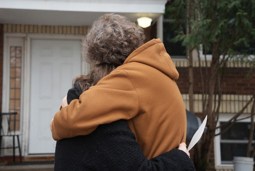 Two people hugging