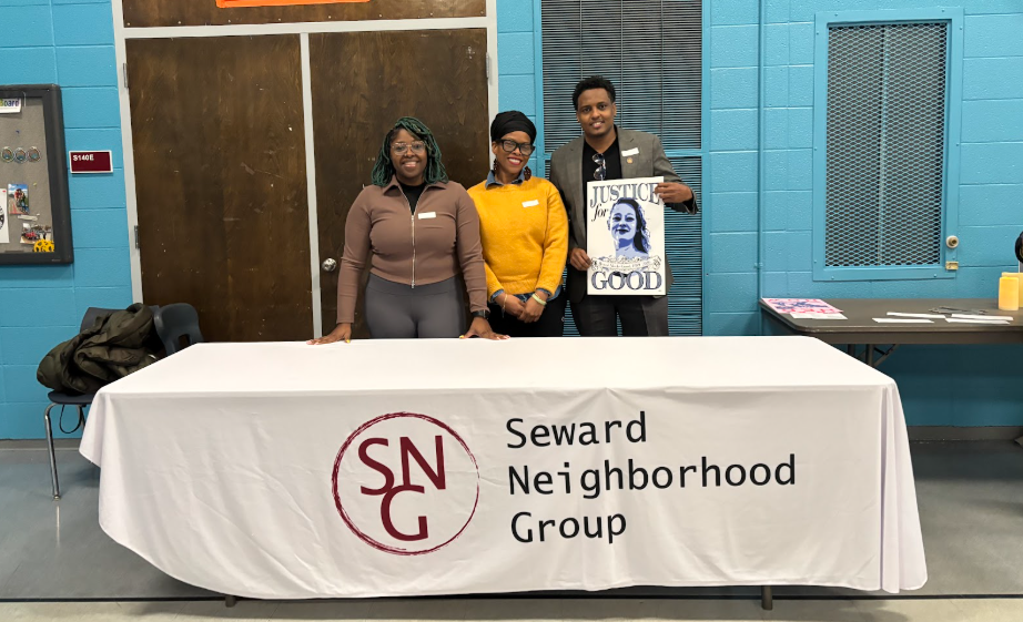  Council Member Wonsley standing and speaking beside Vice President Osman and County Commissioner Conley at Seward STAND.   