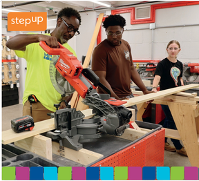 Step Up interns operate equipment with a supervisor in a woodworking workshop
