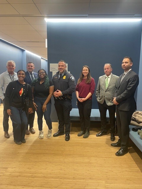 Council Member Wonsley with members of MPD leadership and the Felony Assault Shooting Team.