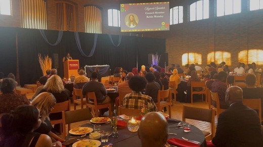 Council Member Wonsley speaking at the Augsburg Umoja Banquet.