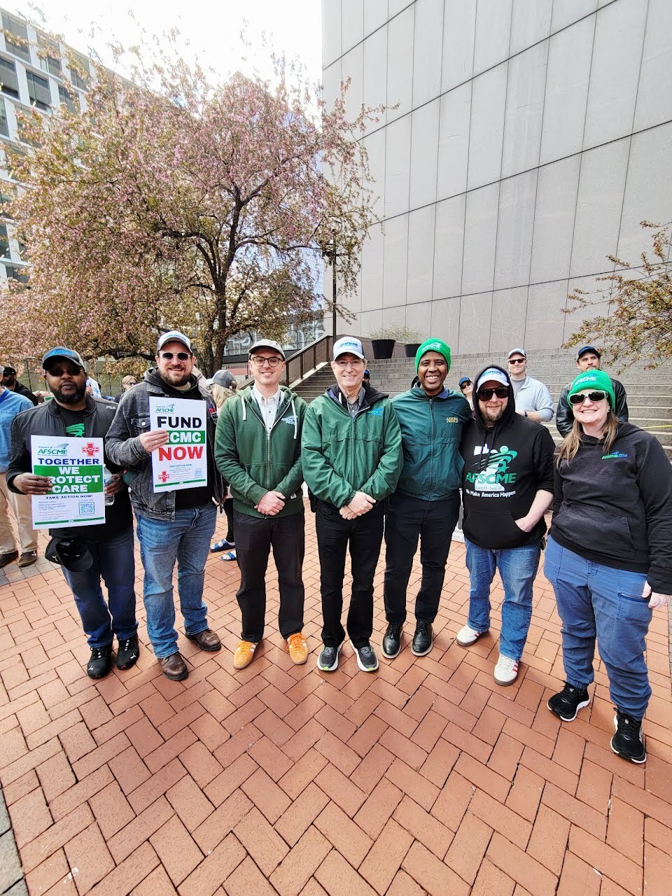 Photo of CM Stevenson with group of workers at May Day celebration/worker picket