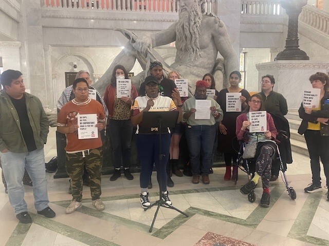 Council Member Wonsley speaking alongside residents in solidarity with Cathrine Doe. 