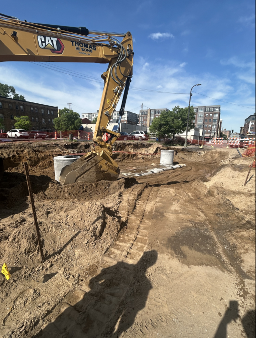 Backfill operations for storm culvert at 15th St. 