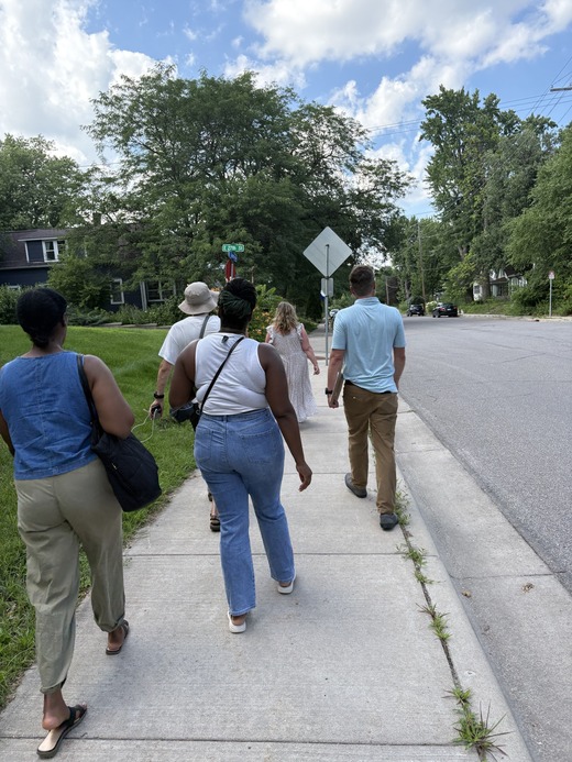 Council Member Wonsley, Director Sexton, and Ward 2 neighbors on a street where residents are asking for more safe and livable infrastructure.