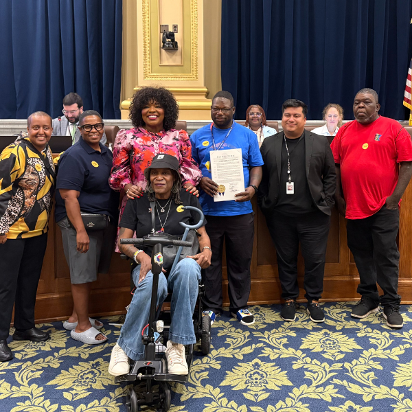 Council Members LaTrisha Vetaw and Jason Chavez with honored guests in City Council Chambers.