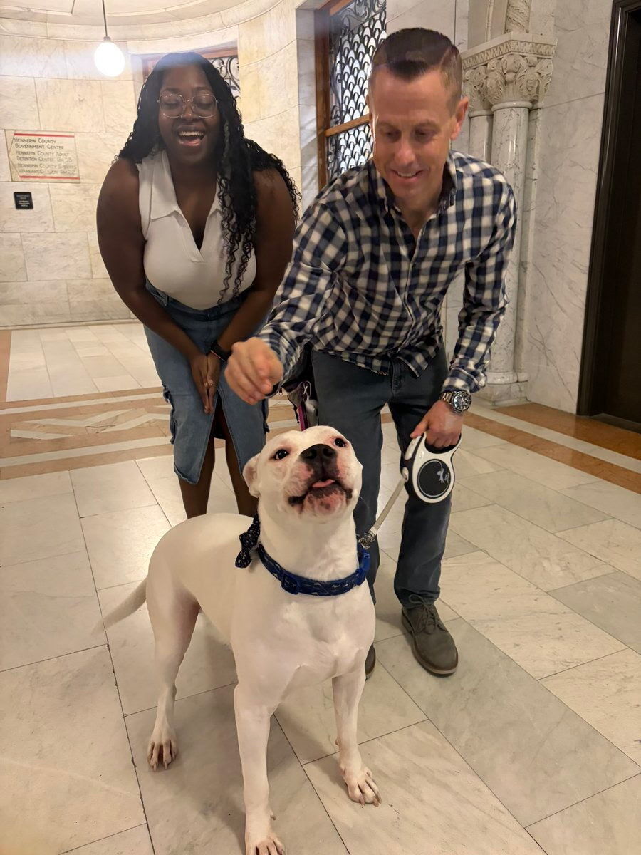 Council Member Wonsley with a Ward 2 resident who is justice-impacted and adopted a dog from Minneapolis Animal Care & Control.
