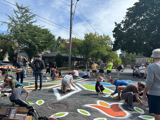 Participants in intersection at Bryn Mawr Paint the Pavement event