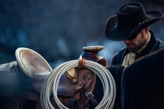 Cowboy and Saddle