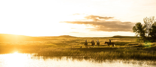 Horseback riding at Harbaugh Ranch near Jordan. Photo by Montana Department of Commerce.