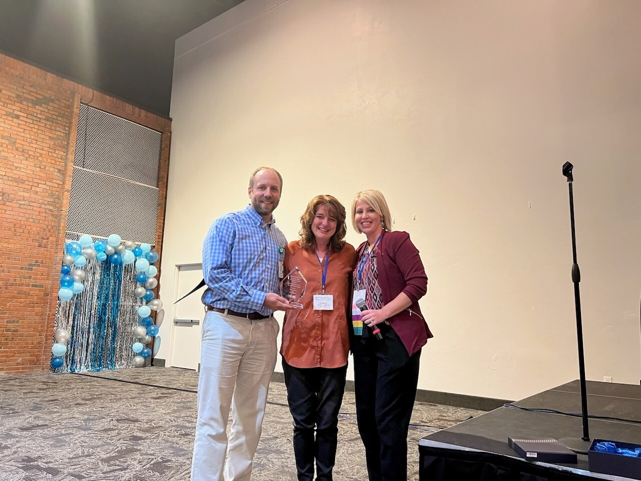 Marcus and Ida receiving and award