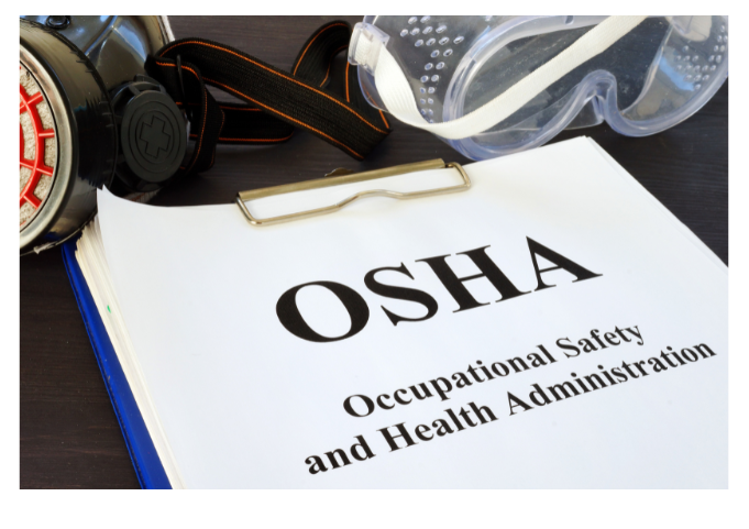 clipboard with paper attached that read OSHA Occupational Safety and Health Administration 