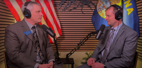 Senators Regier and Glimm discussing the biennial budget.