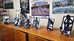 Sports plaques and figures