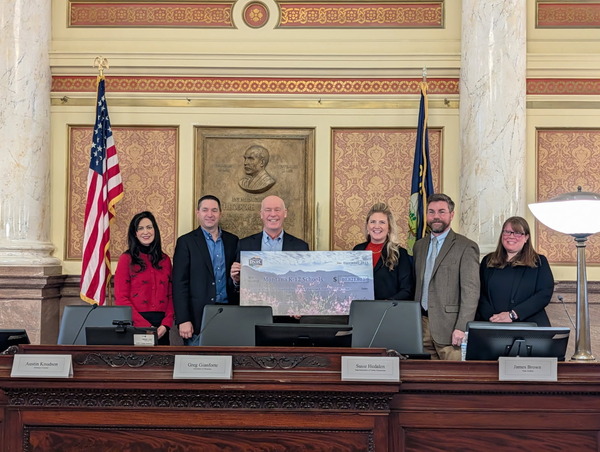 Montana Land board members being presented State Trust Land Revenue check