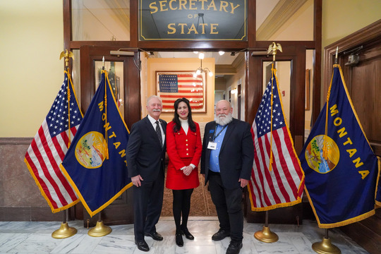 Secretary Christi Jacobsen with Gary Parry and Denley Loge