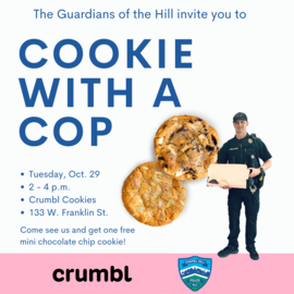 Cookie with a Cop advertisement with two cookies and an officer holding a box of cookies