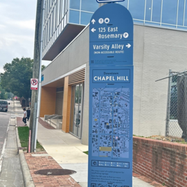 Wayfinding sign on Rosemary St. sidewalk