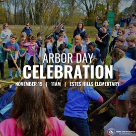 School kids gathered around a tree with shovels
