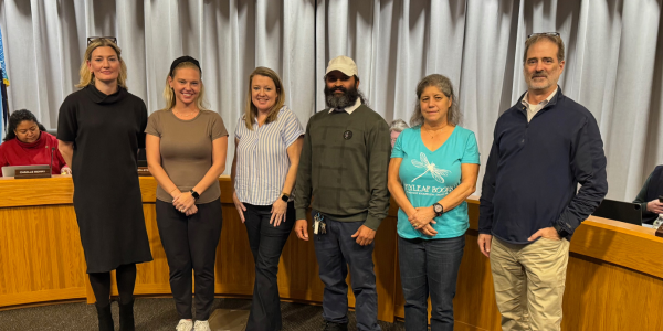 Council Member Sharp presenting Small Business Saturday proclamation