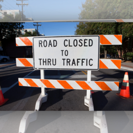 Road closed to thru traffic sign