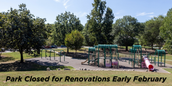 Community Center Park playground equipment and trees