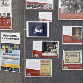 Black History Month display of photographs of prominent Black trailblazers at the library