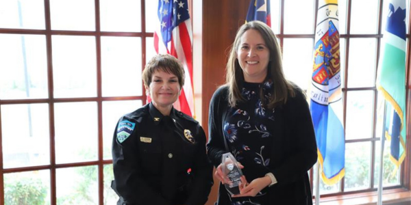 Chief Celisa Lehew and Sarah Belcher with award