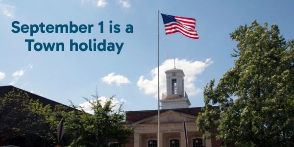 September 1 is a Town Holiday - American flag waving in front of post office on franklin street
