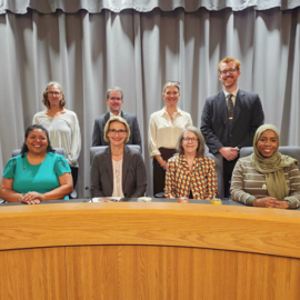 Council sitting at dais - 2025