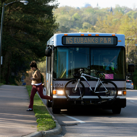 Person disembarking NS bus on MLK