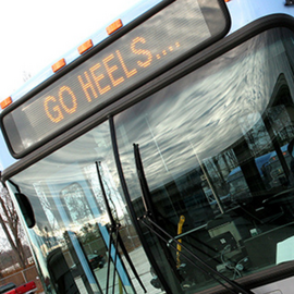 Tar Heel Express bus that says Go Heels