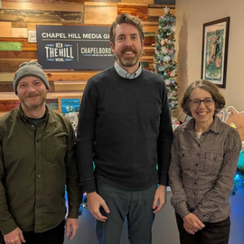 John Richardson with other community leaders at WCHL radio studio