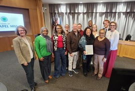 Council Members with people accepting Mentoring Month proclamation
