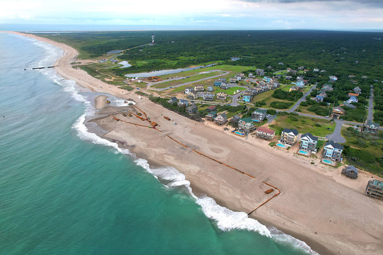 Aerial image of beach nourishment along the beach in Buxton close by the Cape Hatteras Lighthouse. 